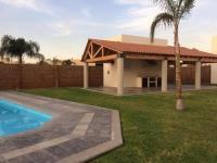 Casa en renta en Puerta Real, Corregidora, Querétaro con jardín y alberca