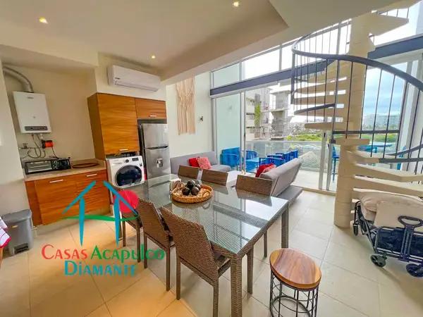 Departamento en condominio con club de playa. Terraza con vista a la alberca