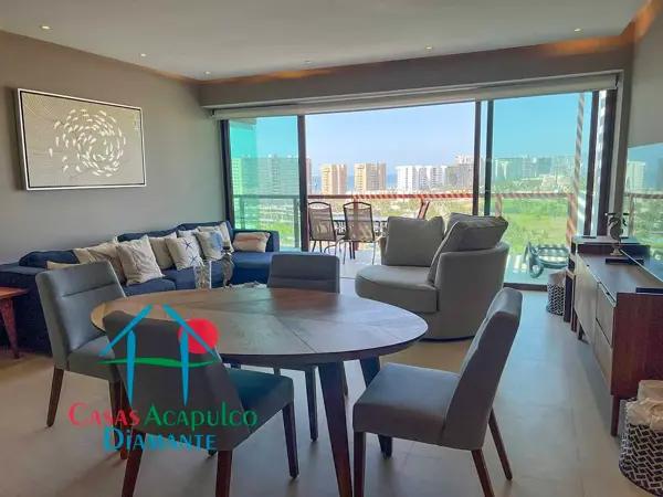 Elegante departamento con terraza con vista a las áreas comunes y parcial al mar
