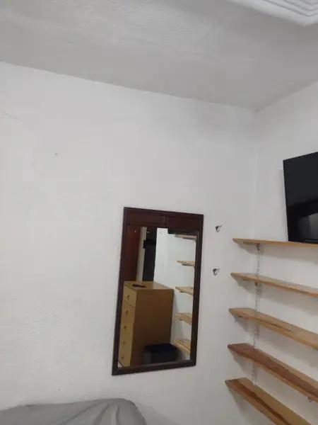 Habitación amueblada