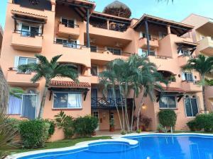 Departamento en venta en Puerto Aventuras, Solidaridad, Quintana Roo Departamento en venta en Puerto Aventuras, Solidaridad, Quintana Roo